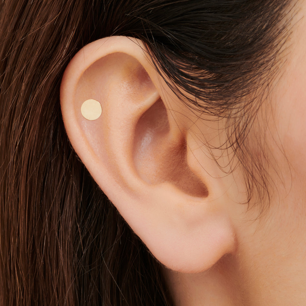 Gold Tragus Piercing